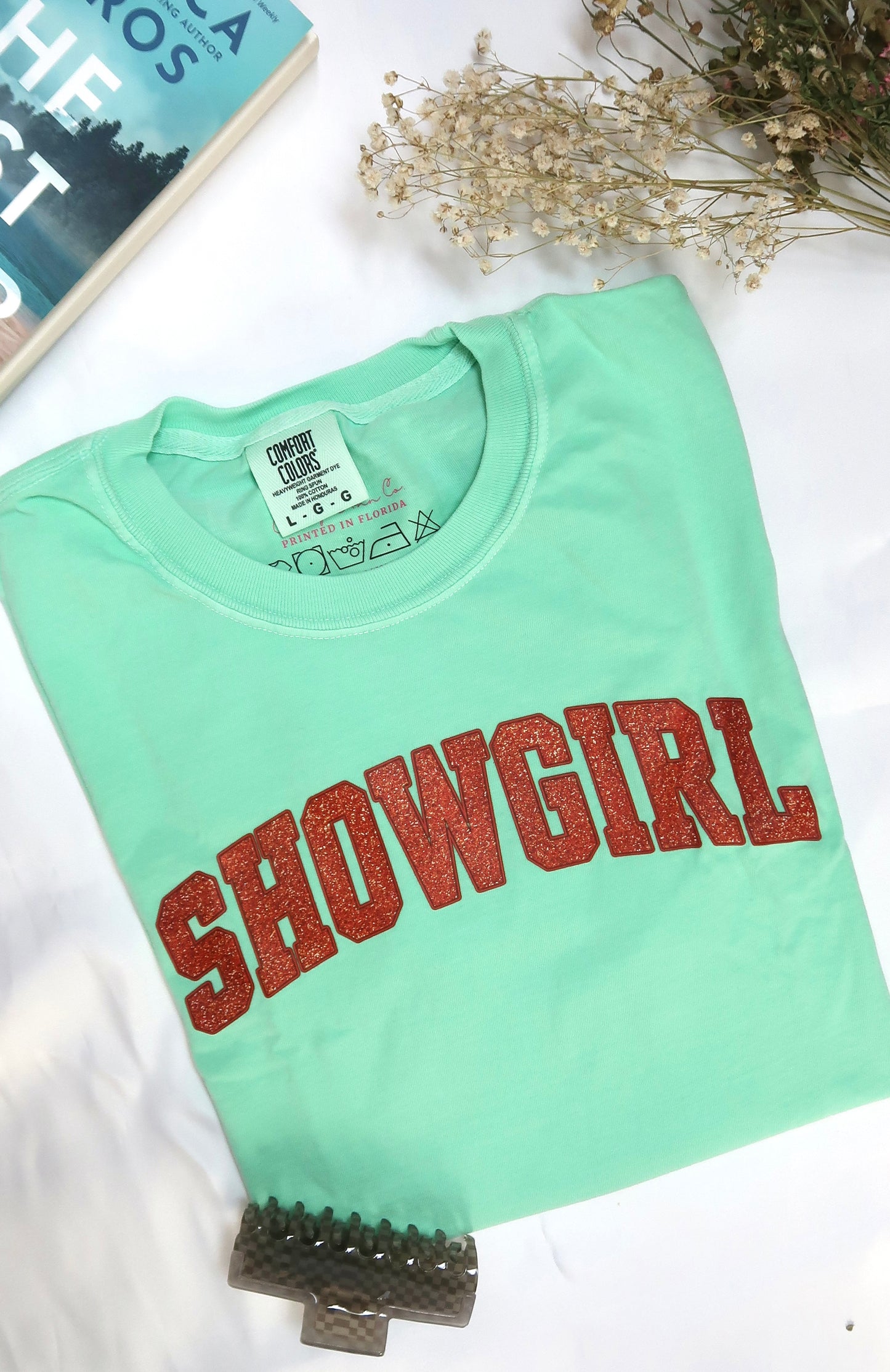 TS12: Showgirl Tee